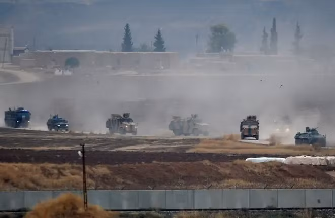Thiết giáp Nga tuần tra chung cùng lực lượng Thổ Nhĩ Kỳ ở Syria. Ảnh: ITN