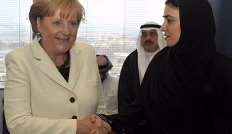 Một nữ ứng cử viên trúng cử, trong lần tiếp xúc Thủ tướng Đức Angela Merkel vào năm 2010.