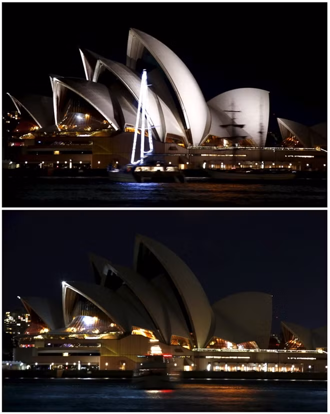 Nhà hát Opera tại Sydney với hai hình ảnh trái ngược, lung linh trong ánh điện và im lìm trong bóng tối. Ảnh: Reuters.