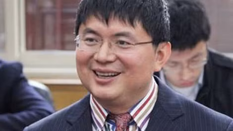 Ông trùm Xiao Jianhua trước khi bị bắt. Ảnh: SCMP.