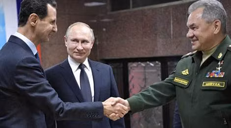 Tổng thống Nga Vladimir Putin, Bộ trưởng Quốc phòng Sergei Shoigu và Tổng thống Syria Bashar al-Assad tham dự cuộc họp ở Damascus, Syria, ngày 7-1-2020.