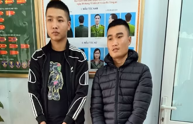 Trường và Tuấn tại cơ quan Công an. Ảnh: M.T