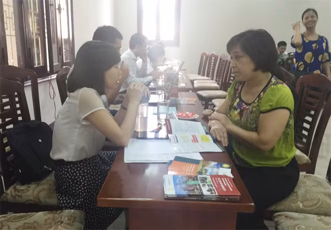 Tư vấn đăng ký xét tuyển cho thí sinh và phụ huynh vào Học viện Ngân hàng ngày 10-8.