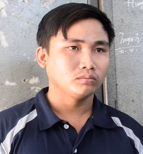 Đối tượng Trần Đình Thái tại cơ quan Công an. Ảnh : PLO