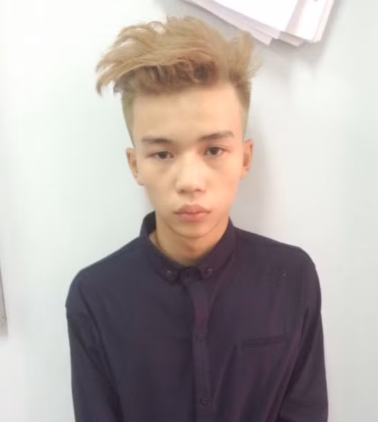 Hung thủ Lê Anh Tuấn sau khi bị bắt khẩn cấp.