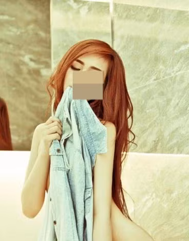 Một thiếu nữ tự nguyện chụp ảnh nude. (ảnh chỉ có tính minh họa) Một thiếu nữ tự nguyện chụp ảnh nude. (ảnh chỉ có tính minh họa)