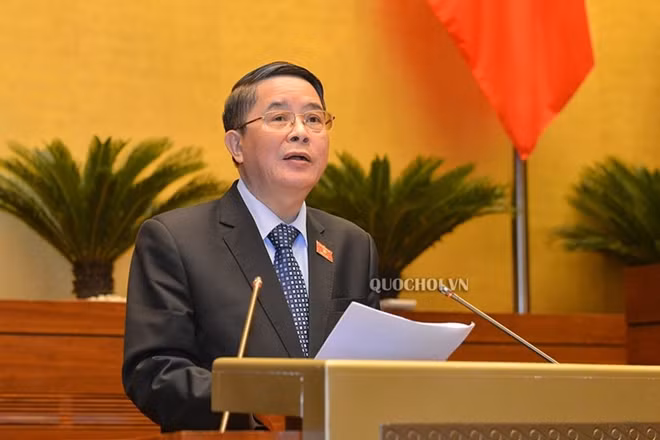 Chủ nhiệm Ủy ban Tài chính - Ngân sách của Quốc hội Nguyễn Đức Hải trình bày báo cáo thẩm tra