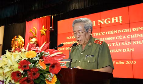 Trung tướng Vũ Thuật trình bày Báo cáo sơ kết 5 năm thực hiện Nghị định 106 của Chính phủ trong CAND.