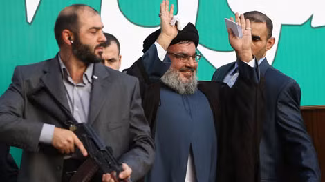 Lãnh đạo tối cao Hassan Nasrallah (giữa) và các cận vệ.