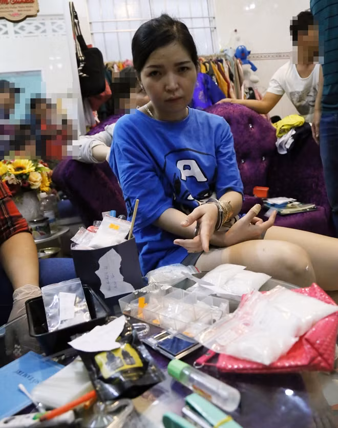 Đối tượng My cùng tang vật.