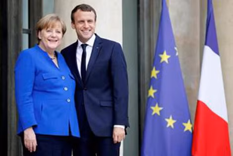 Thủ tướng Đức Merkel và Tổng thống Pháp Macron. Thủ tướng Đức Merkel và Tổng thống Pháp Macron.
