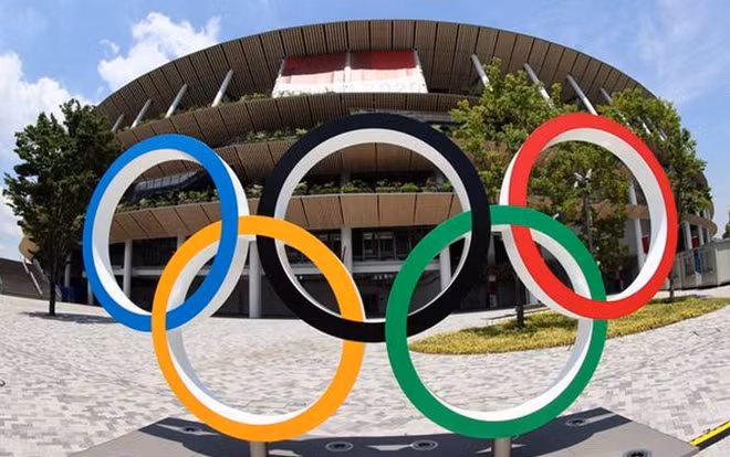 Nhiều chuyên gia y tế vẫn nghi ngờ về nguy cơ lây nhiễm do Olympic. Ảnh: Reuters