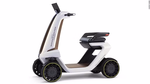 Cũng tại Tokyo Motor Show, Honda trưng bày mẫu scooter 4 bánh chạy điện Wander Walker với phong cách thiết kế khá bắt mắt. Cũng tại Tokyo Motor Show, Honda trưng bày mẫu scooter 4 bánh chạy điện Wander Walker với phong cách thiết kế khá bắt mắt.