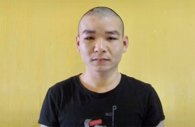 Hồ Quang Định tại cơ quan Công an.