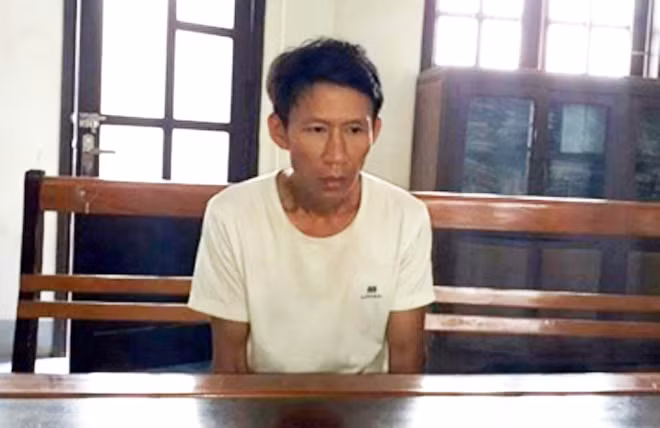 Lê Văn Hùng tại cơ quan Công an.