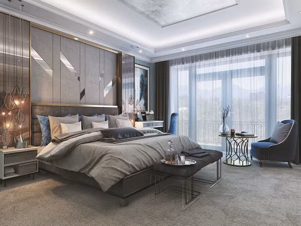 Phòng ngủ cao cấp có sự kết nối hài hòa trong màu sắc cũng như hình khối giữa giường, chăn gối, bàn phấn… Thêm một nét nhấn nhá là bộ bàn ghế nhỏ xinh, êm ái cho chủ nhân thoải mái ngắm nhìn không gian xanh bên ngoài.