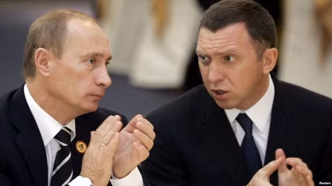 Ông Oleg Deripaska (phải) và Tổng thống Putin.