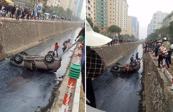 Người dân giải cứu nữ tài xế. Ảnh; Đ.T.H.