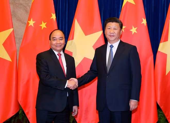 Thủ tướng Nguyễn Xuân Phúc và Tổng Bí thư, Chủ tịch nước Trung Quốc Tập Cận Bình. Ảnh: TTXVN.