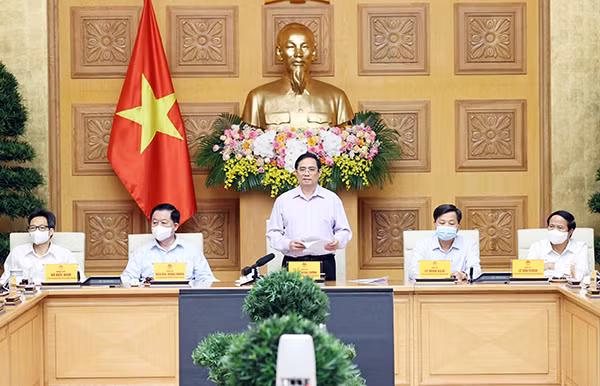 Thủ tướng Phạm Minh Chính phát biểu tại cuộc gặp mặt. Ảnh: TTXVN