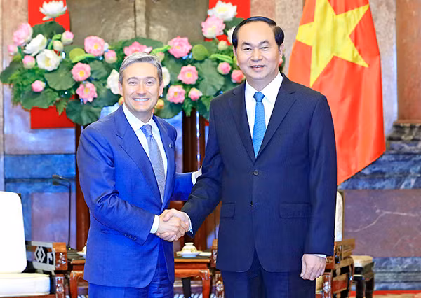 Chủ tịch nước Trần Đại Quang và Bộ trưởng Bộ Thương mại Quốc tế Canada Fran Cois-Philippe Champagne. Ảnh: TTXVN