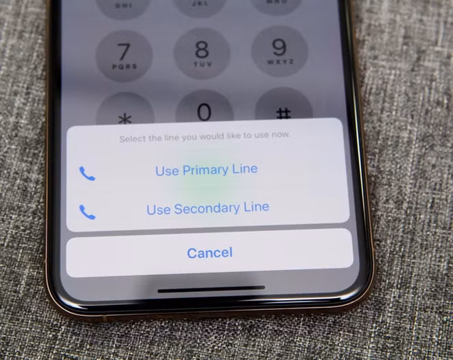 Cách gọi trên iPhone 2 SIM vật lý. Ảnh: Vne.