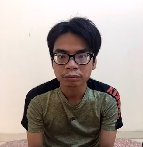 Đối tượng Nguyễn Mạnh Hùng tại cơ quan điều tra.