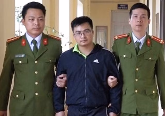 Đối tượng Phạm Quốc Huy tại cơ quan Công an. Đối tượng Phạm Quốc Huy tại cơ quan Công an.
