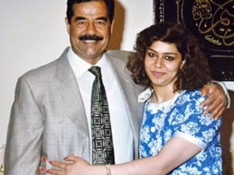 Raghad Hussein và ông Saddam Hussein.