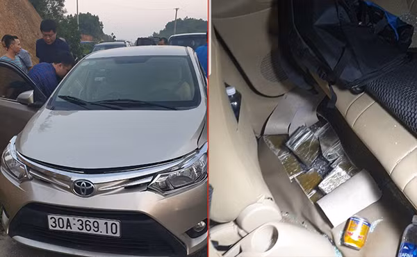Chiếc xe ô tô mà các đối tượng dùng để vận chuyển “hàng” và số ma túy dưới tấm lót dưới sàn xe ô tô. Chiếc xe ô tô mà các đối tượng dùng để vận chuyển “hàng” và số ma túy dưới tấm lót dưới sàn xe ô tô.