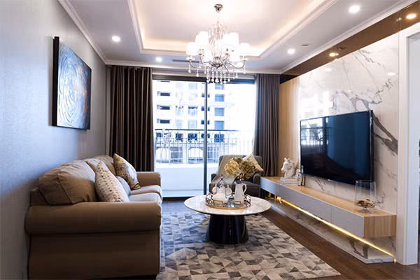 Phòng khách trong căn hộ mẫu 3 phòng ngủ tại dự án của Tập đoàn Sunshine Group.