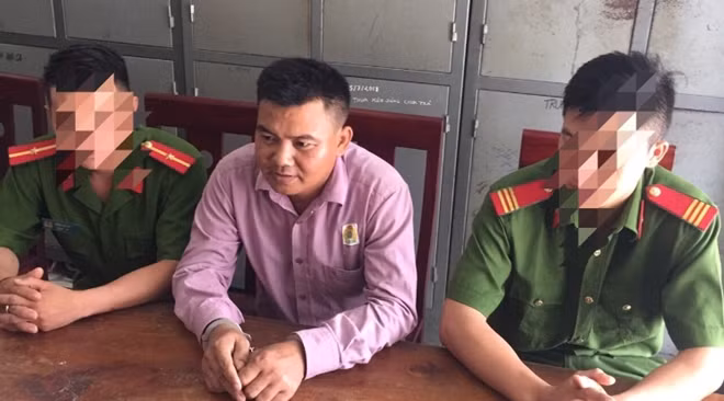 Moong Văn Tình tại Cơ quan điều tra.