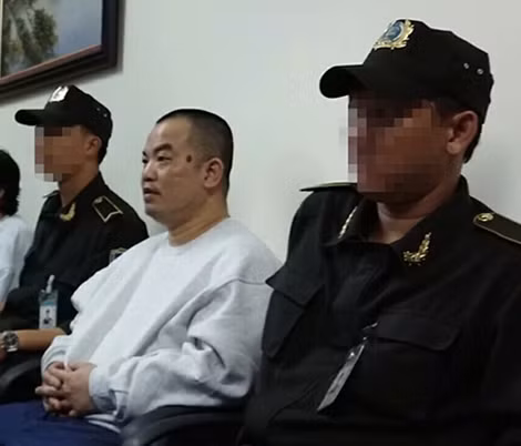 Dũng “thẹo” tại buổi bàn giao giữa Bộ An ninh nội địa Hoa Kỳ và Cơ quan điều tra Bộ Công an Việt Nam tại sân bay Tân Sơn Nhất.