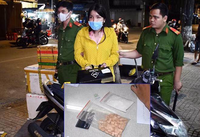 Trần Văn Nghĩa cùng tang vật.