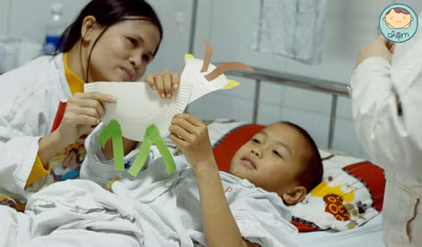 Nụ cười của một bệnh nhân nhí. Nụ cười của một bệnh nhân nhí.