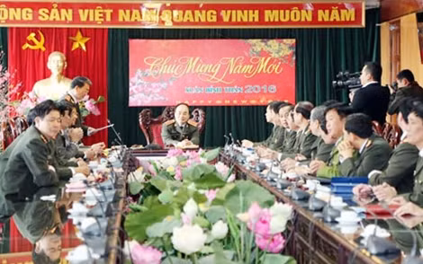Trung tướng Trần Bá Thiều báo cáo tình hình công tác của Tổng cục trong, trước và sau Tết.