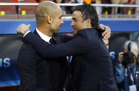 Luis Enrique và đồng đội cũ Pep Guardiola.