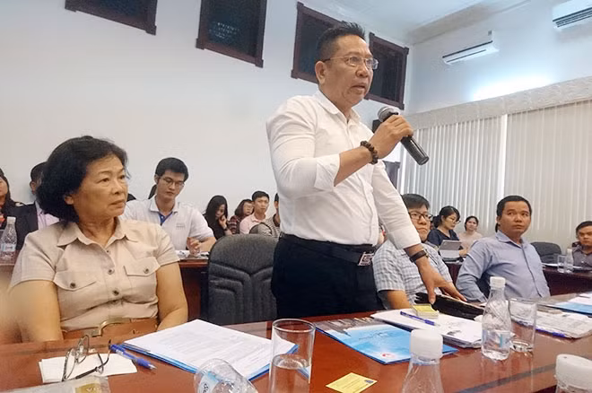 Doanh nghiệp nêu những khó khăn về việc tiếp cận nguồn vốn vay ngân hàng tại tọa đàm ngày 18-7.